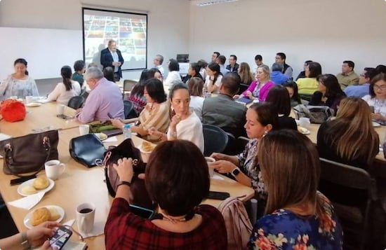 adults sitting in classroom