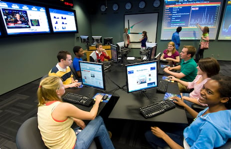 group of people using computers